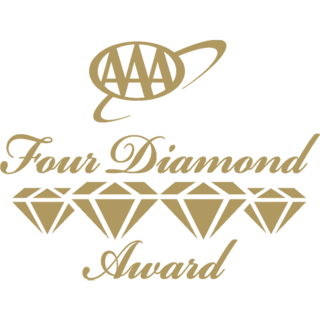 Logo featuring "AAA Four Diamond Award" with diamonds illustrated below, symbolizing high quality and exceptional service in hospitality.